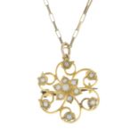 An early 20th century 15ct gold split pearl floral pendant,