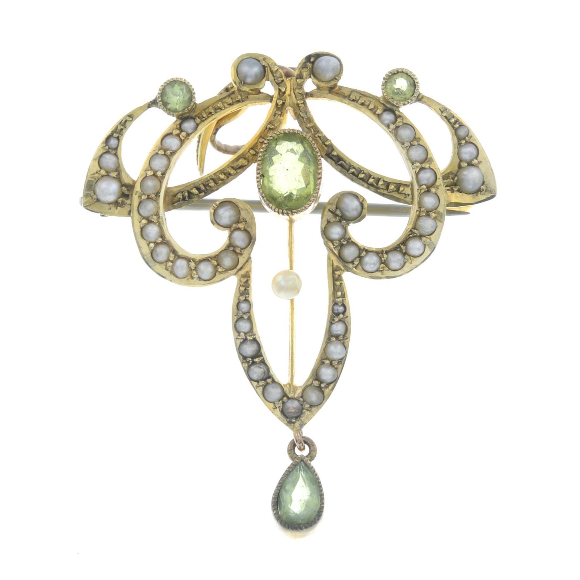 An early 20th century 9ct gold split pearl and peridot brooch.