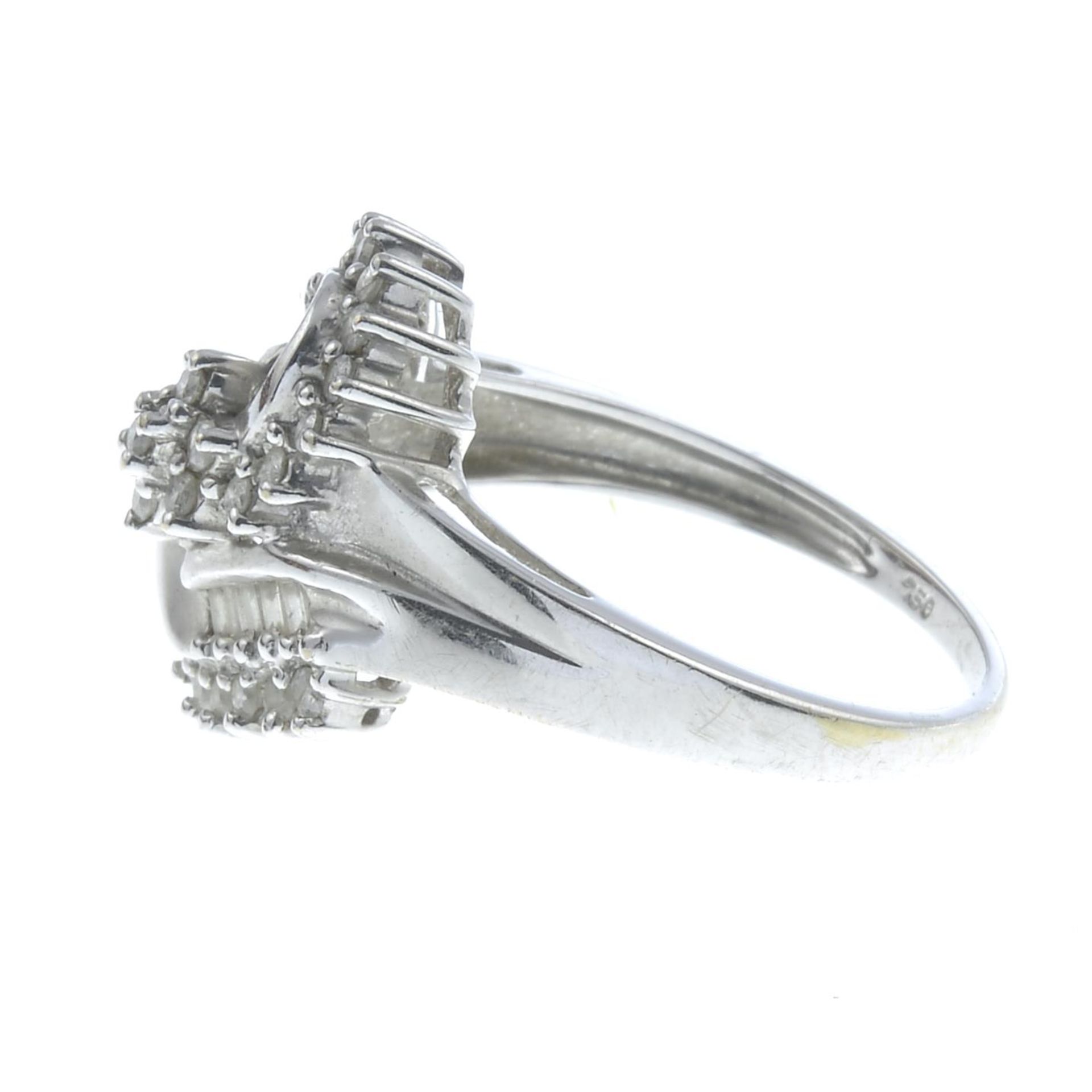 A brilliant and baguette-cut diamond dress ring.Total diamond weight 0.45ct, stamped to band. - Image 3 of 3