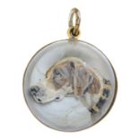A reverse-carved and painted intaglio pointer dog pendant.Stamped 14K.
