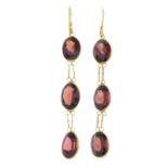 A pair of garnet drop earrings.Length 4.1cms.