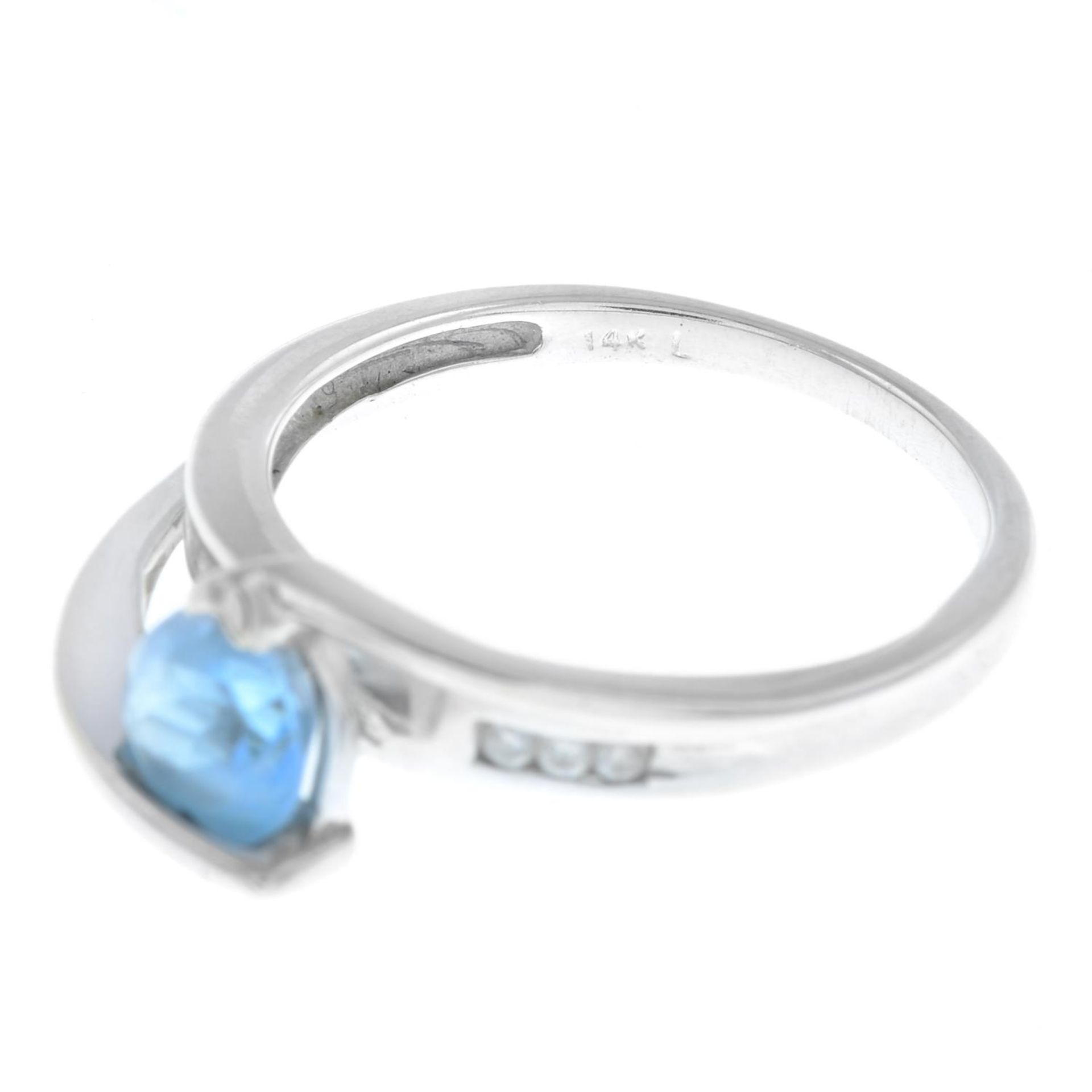 A blue topaz and diamond dress ring.Stamped 14K. - Image 6 of 6