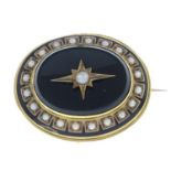 A late Victorian gold onyx, enamel and split pearl brooch.