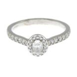 An 18ct gold diamond cluster ring.Total diamond weight 0.40ct,