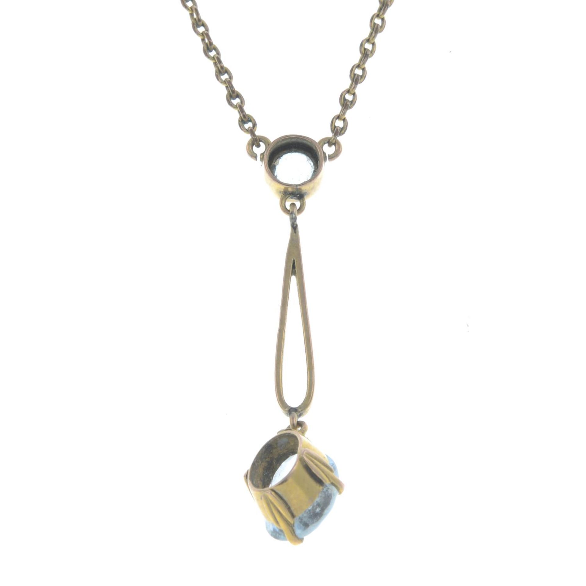 An early 20th century 9ct gold aquamarine pendant, on a 9ct gold integral chain.Stamped 9CT. - Image 2 of 2