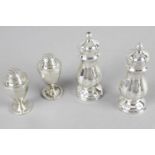 Two pairs of salts and peppers and four other condiment pieces - an urn shaped pair - London 1906