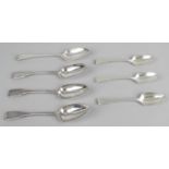 A selection of silver table spoons and dessert spoons,