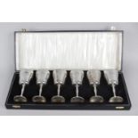 A cased set of six mid-20th century silver goblets,