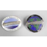 A Verbach Dresden oval metal badge with applied airship upon a blue and white enamelled ground,