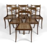 A set of 6 late Regency simulated rosewood dining room chairs,