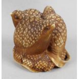 A 19th century carved ivory study depicting quail on millet, signed to base Okatomo.