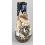 An unusual oriental pottery vase of slender baluster shape,