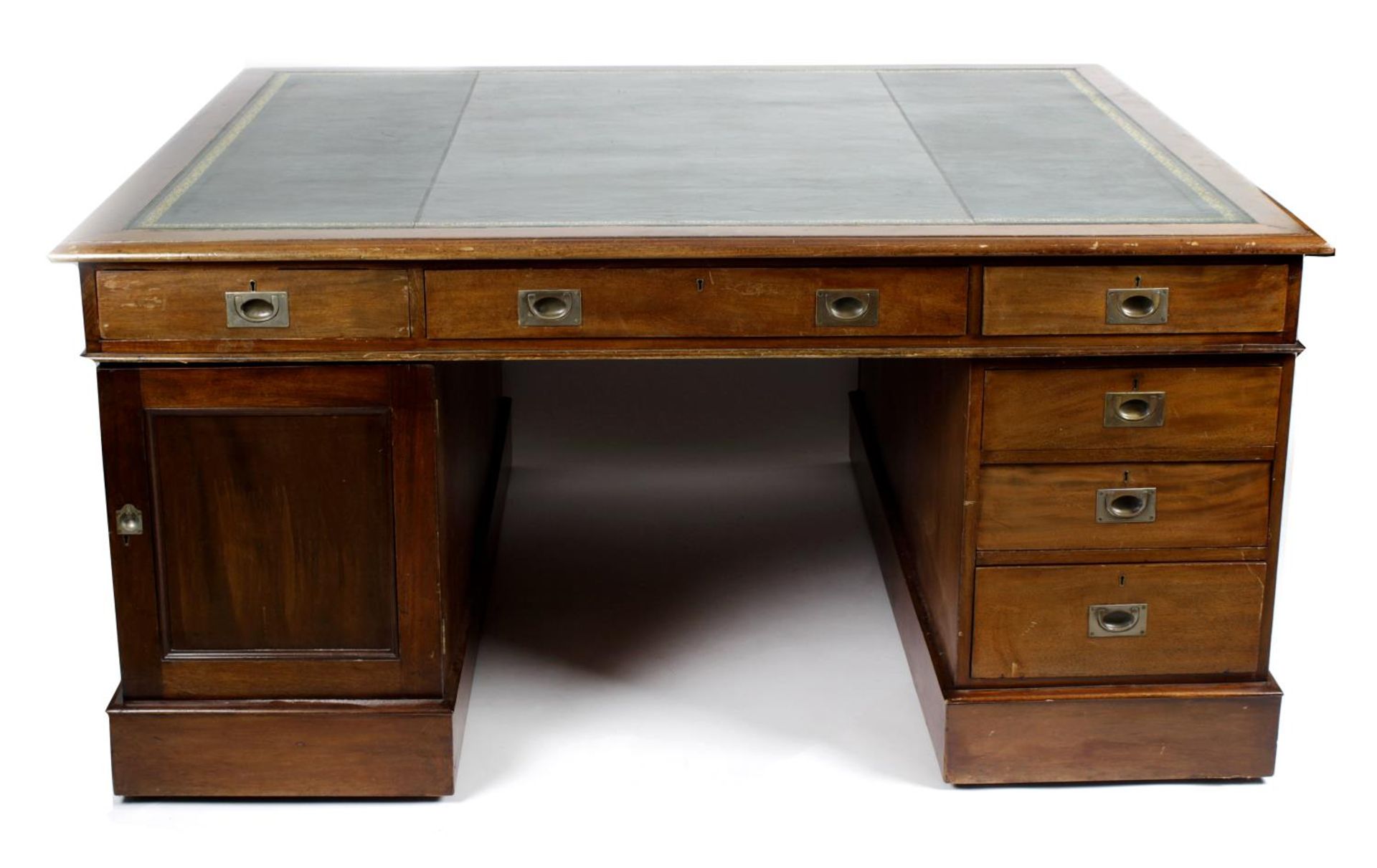 A large early twentieth century mahogany twin pedestal partners desk,