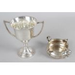 Three items of silver - a small twin-handled trophy - Birmingham 1934,
