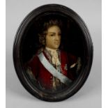 An antique painted wax oval half-length portrait depicting Louis XV,