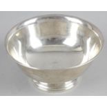 A white metal bowl and two other smaller bowls - the larger one marked on the base 'Paul Revere