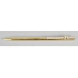 An S.T. Dupont gold plated propelling ball point pen,