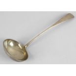 A Victorian silver Old English pattern soup ladle.