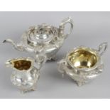 An early 19th century Scottish silver matched three piece tea service,