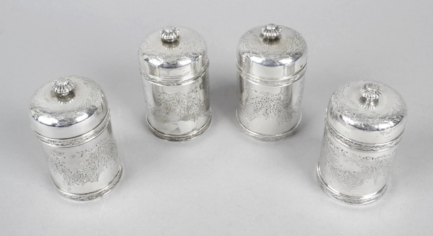 A set of four French silver pepper pots or small casters,
