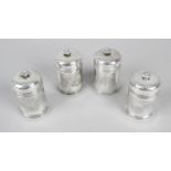 A set of four French silver pepper pots or small casters,