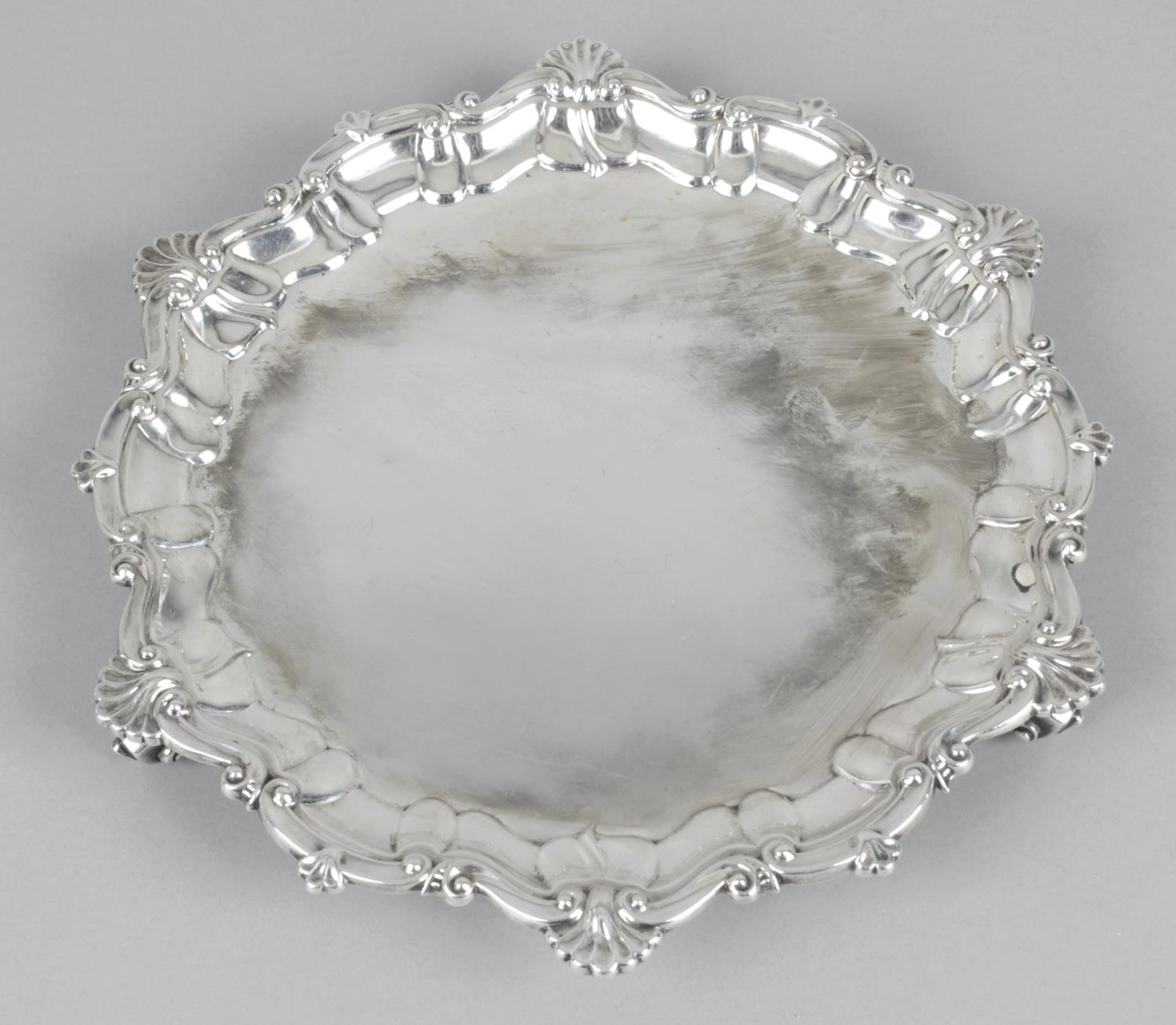 A small Edwardian plain silver salver,