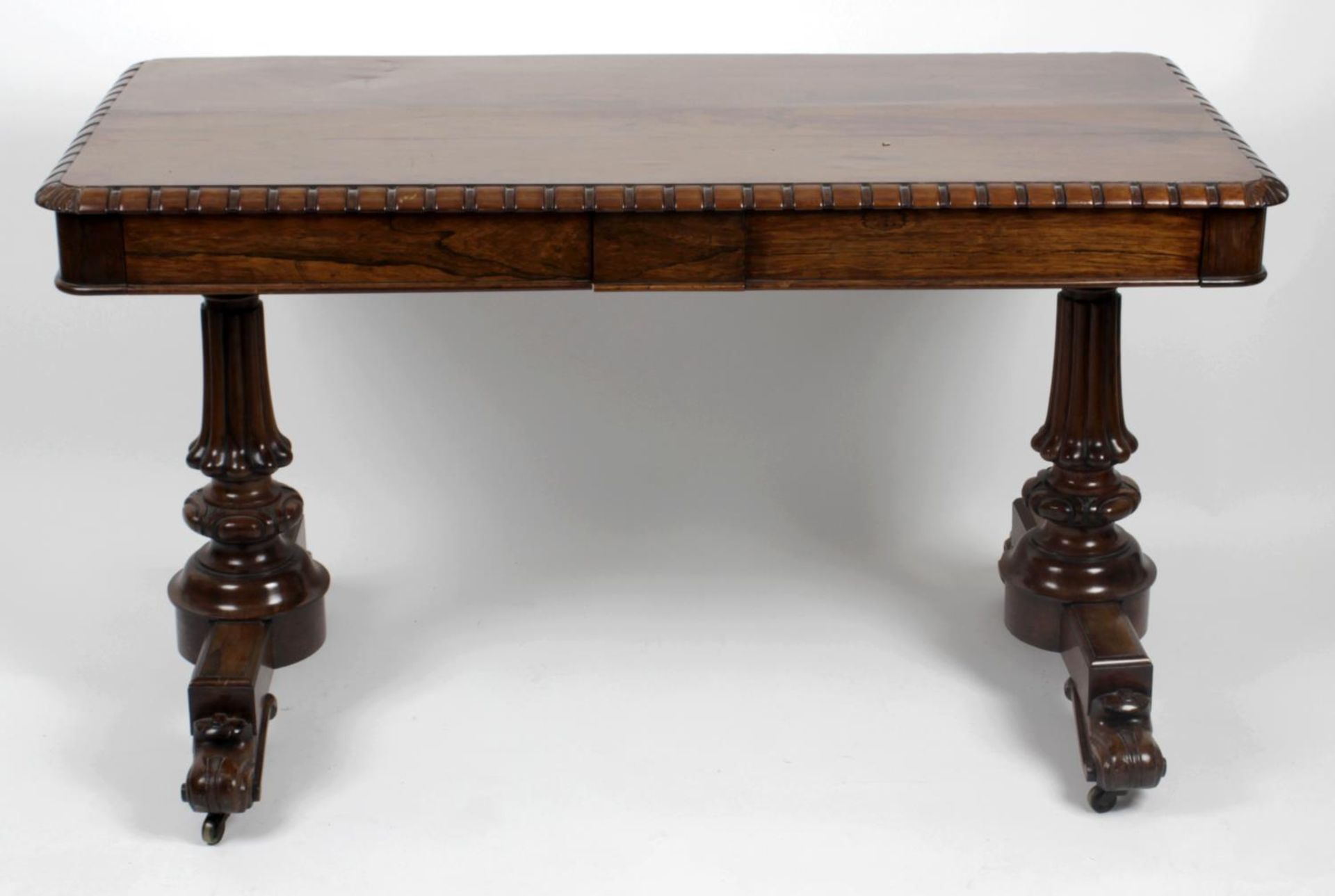 A Victorian rosewood side table,