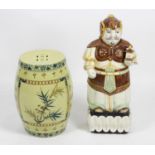 An Oriental pottery garden seat of pierced barrel form,