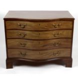 A 19th century crossbanded mahogany serpentine fronted chest,