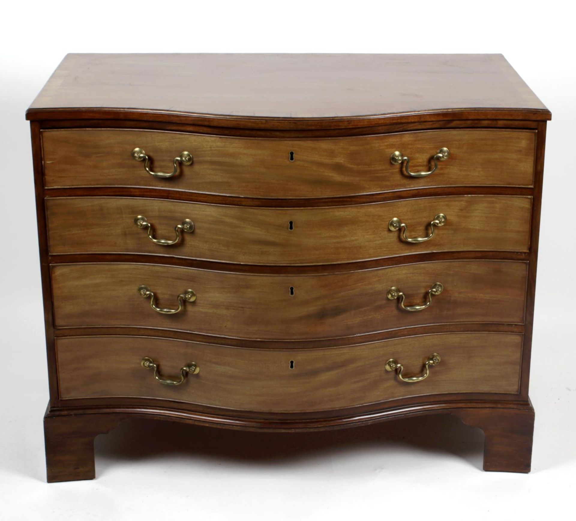 A 19th century crossbanded mahogany serpentine fronted chest,