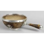 A 19th century turned walnut bowl with applied plated mounts and single handle to side,