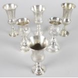 Two pairs of small silver kiddush cups,