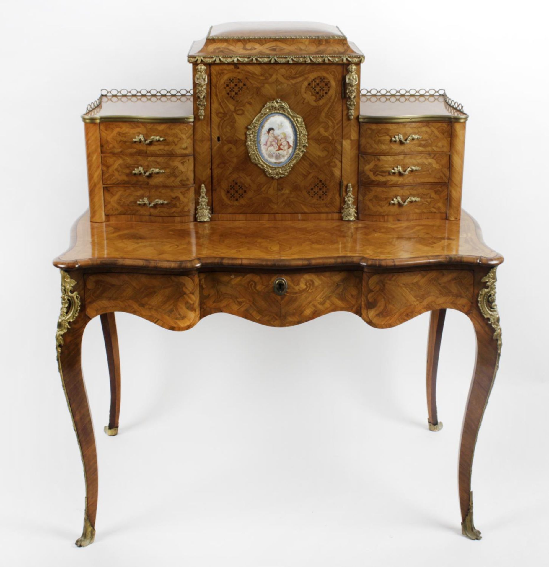 A late 19th century French satinwood and marquetry inlaid bonheur du jour,