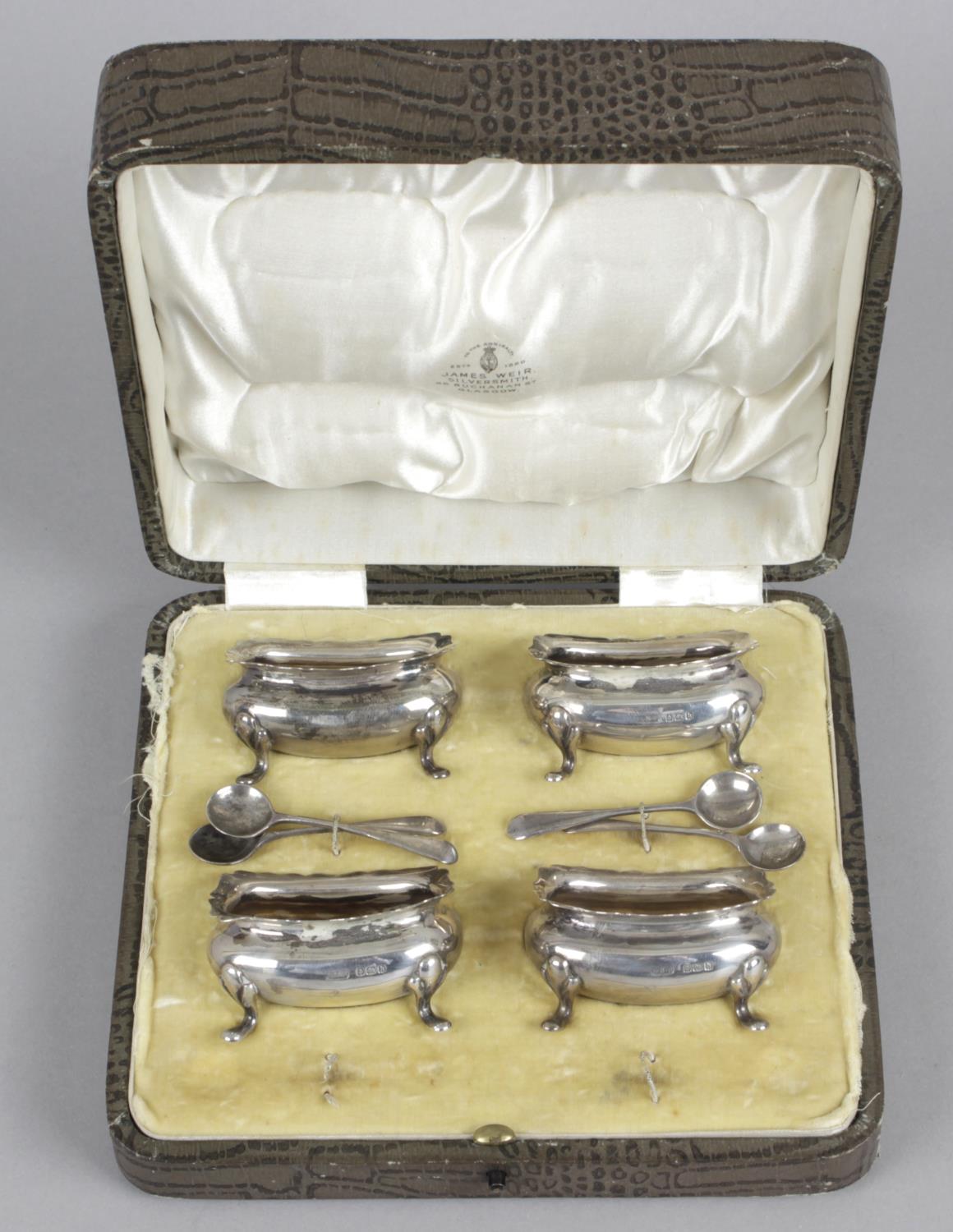 A cased set of four Edwardian silver open salts,