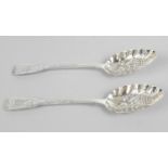 A matched pair of late George III silver 'berry' spoons,
