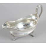 A George III silver sauce boat,