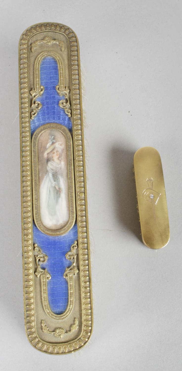 An early 20th century miniature hairbrush,