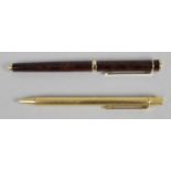 A Cartier gold plated cased ball point pen,