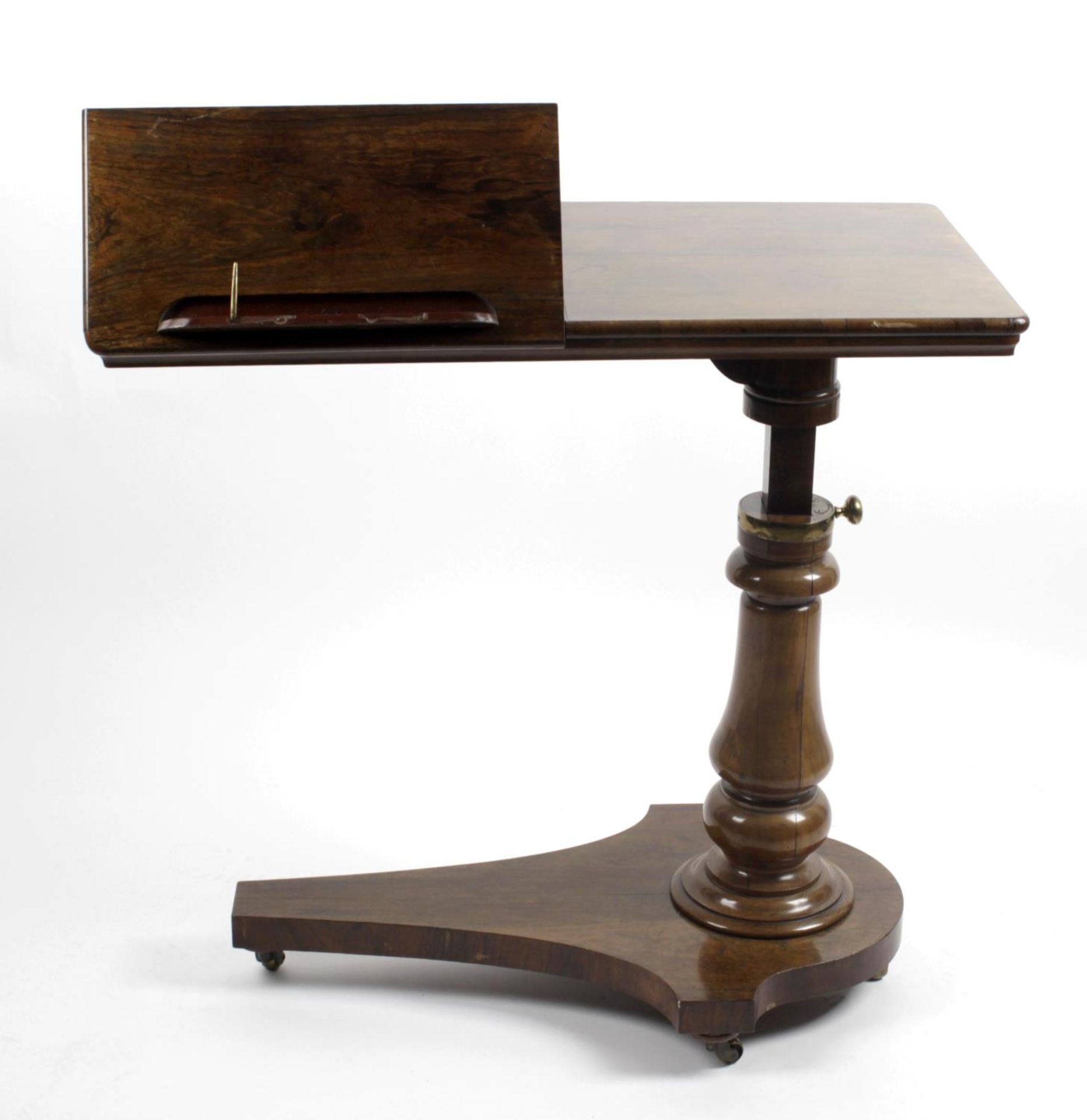 A 19th century rosewood reading table,