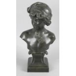 After Alp-de-Tombay - a late 19th century bronze head and shoulder bust modelled as a young male