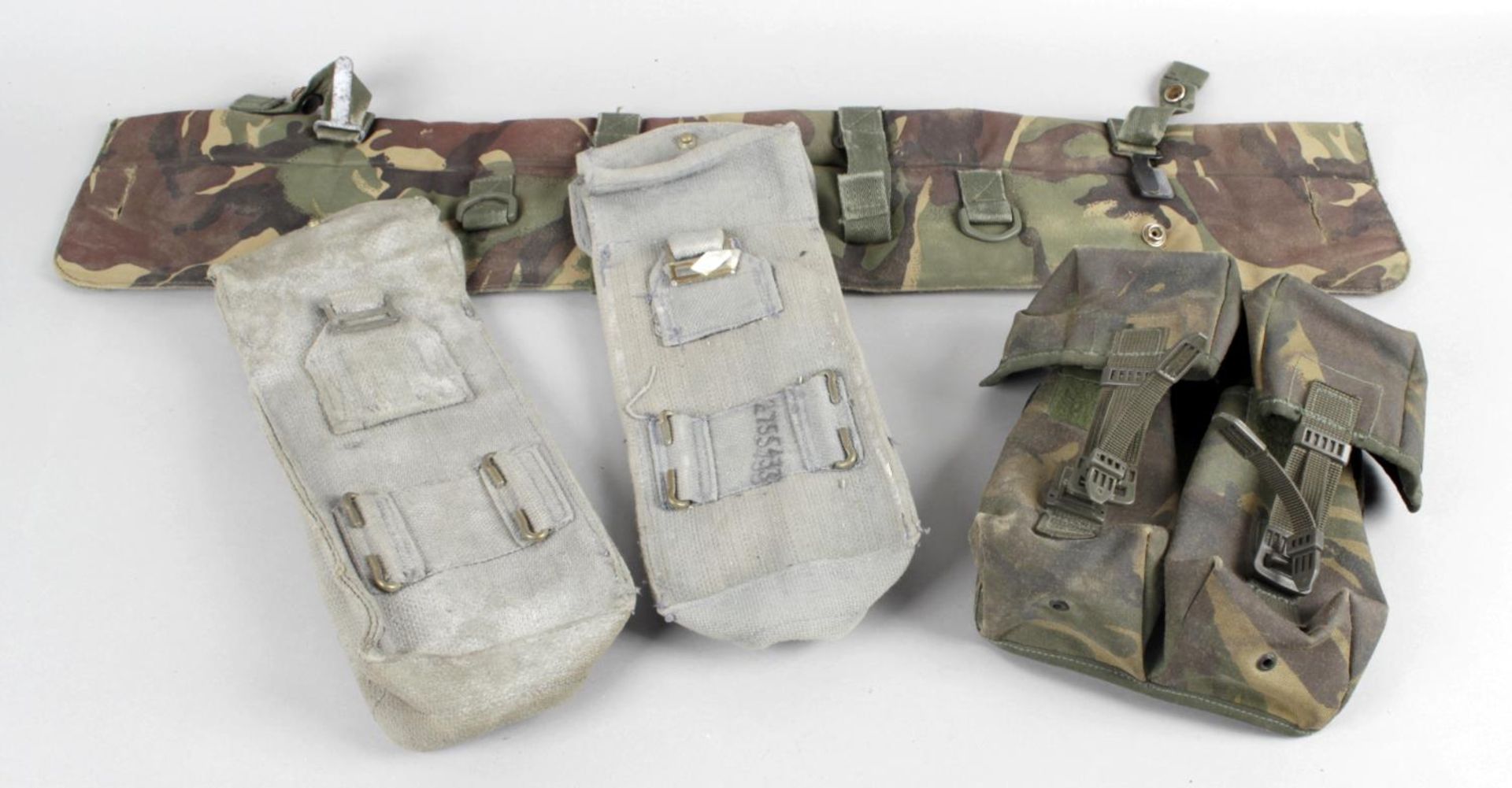 A mixed selection of British military uniform accessories,