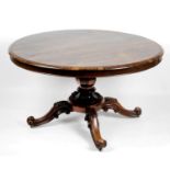 A 19th century rosewood snap top table,