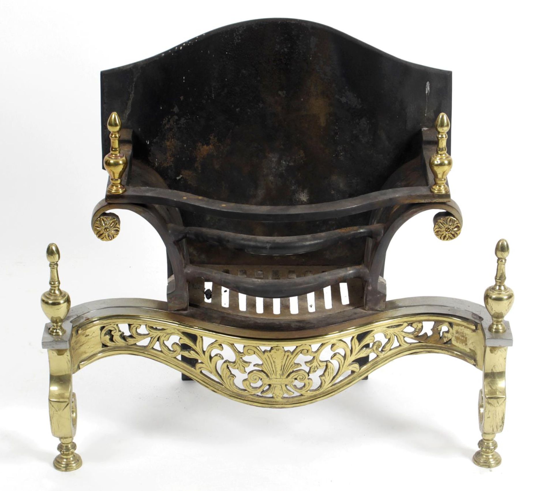 A cast iron and brass fire basket,