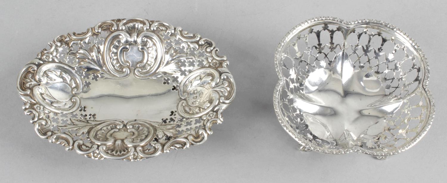 Two pierced silver sweetmeat dishes.