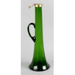 A Victorian green glass claret jug,