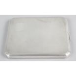 A silver cigarette case,