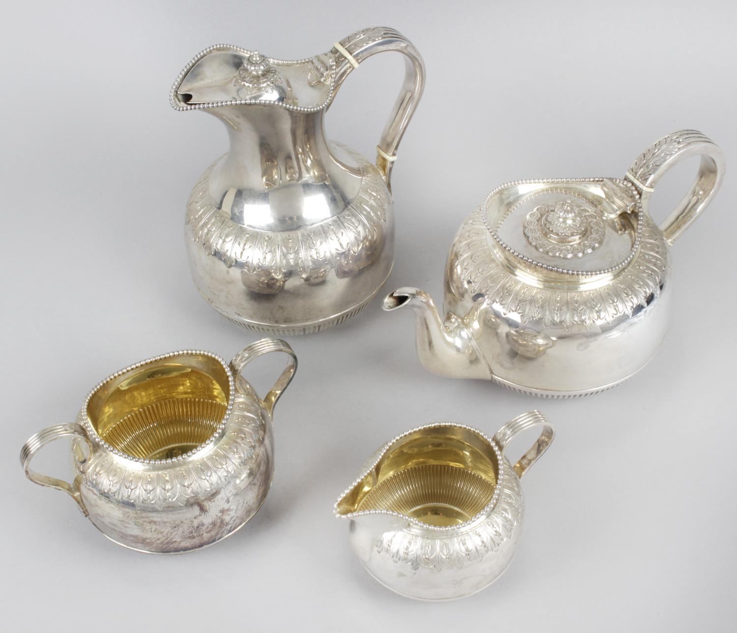 A late Victorian silver matched three piece tea service,