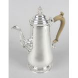 A mid-20th century silver coffee pot by Mappin & Webb,