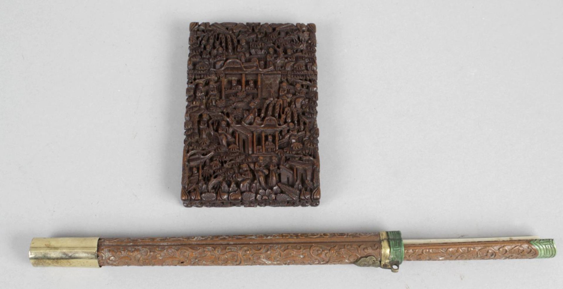 A 19th century Cantonese carved wooden visiting card case and cover,