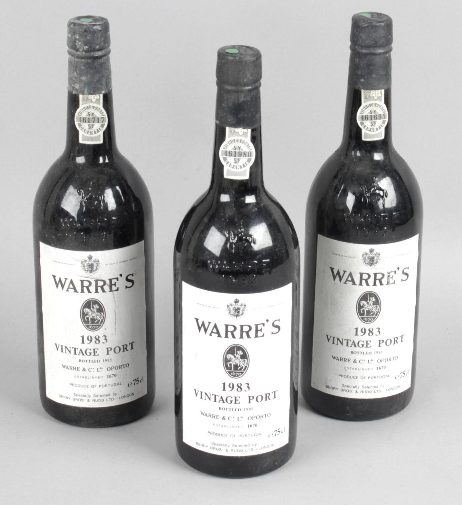 A selection of assorted bottles of port,